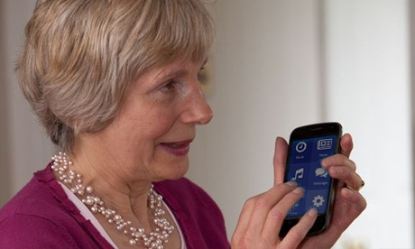 A blind woman touching a smartphone display